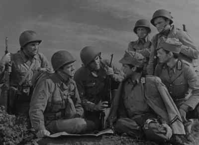 He says he knows all about maps, he's a corporal. - A Walk in the Sun