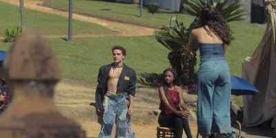 He shows off a denim skirt... - An Unforgettable Year – Summer