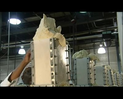 HE SPLITS THE BATCH ON A TABLE,
THEN CREATES CHUNKS - How It's Made