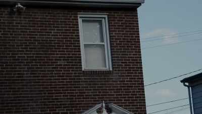 He was standing in front of a mirror,
combing his hair. - The Keepers