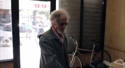 He steps down,
turns around - Frank Serpico