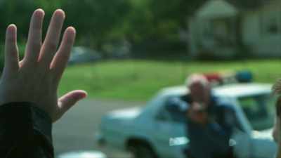He steps out calmly,
turns around - Homicide Hunter: Devil in the Mountains