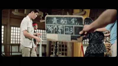 'He strikes at Inosanto with a large log, - The Final Game of Death