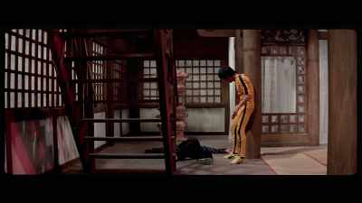 'He stumbles to the stairway
and barely has time to catch his breath, - The Final Game of Death