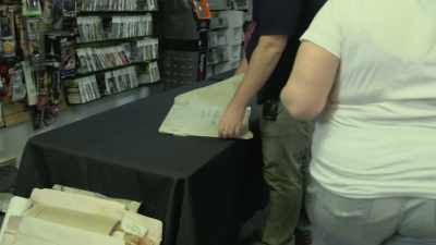 - He takes it out,
and he brings it in, - Video Game Box Art: The Stories Behind the Covers