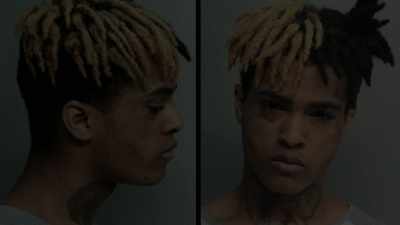 He had tattoos on his face.
Half blond, half black hair. - Look At Me: XXXTENTACION