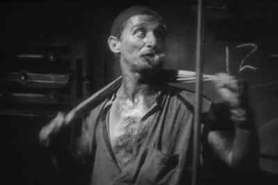 "He thinks we're goin'
ashore to play marbles!" - The Docks of New York