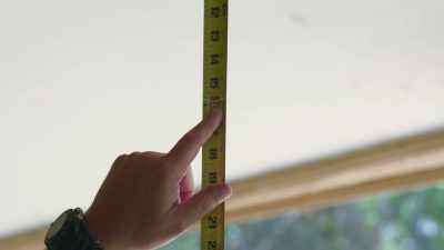 He is using it to find out
if the doors
will hang straight. - Renovation Impossible
