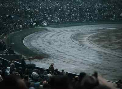 Heavy rain had literally
saturated the track - XIVth Olympiad: The Glory of Sport