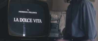 [helicopter whirring
on television] - In Search of Fellini