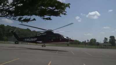 [helicopter whirring] - The Accidental President
