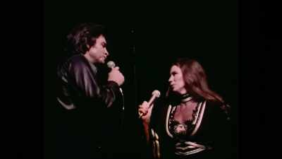 ♪ Help me make it
through the night ♪ - June