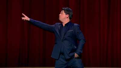 Her arm is subconsciously reaching
for her mobile. - Michael McIntyre: Showman