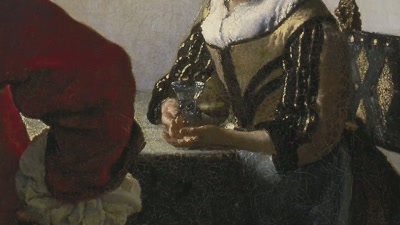 Her hand is gently open with
acceptance or perhaps amusement? - Vermeer: The Greatest Exhibition