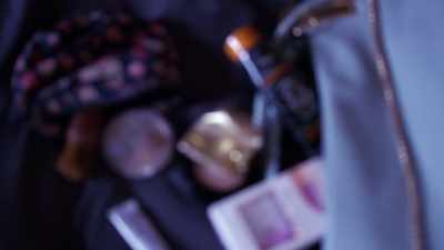 Her purse was scattered
on the bed. - New York Homicide