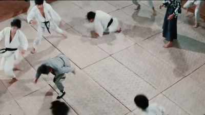 Here comes the lethal
lady of kung fu. - Enter the Clones of Bruce