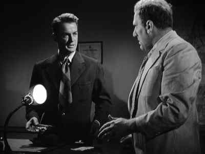Here. Get the suit cleaned. - The Dark Corner