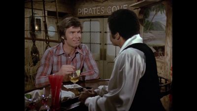 - Here you go.
A pisco punch. - The Love Boat