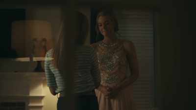 Here. I thought this would be nice.
It matches your dress. - The Girl from Plainville