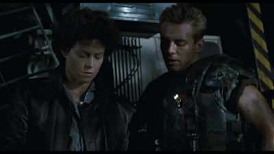 Here, I want you to put this on. - Aliens Expanded