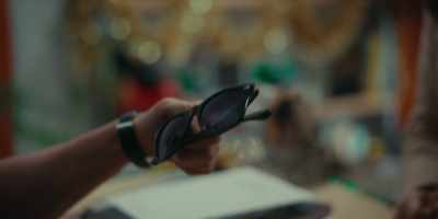 Here, Merry Christmas. These
are your glasses, sunglasses. - The Holiday List