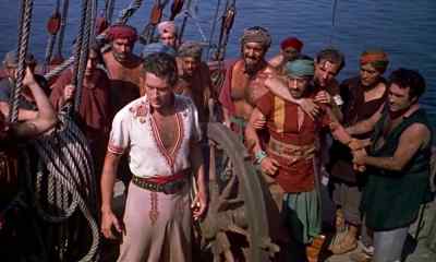 Here. The magician's cloak
will make a flag for us. - The 7th Voyage of Sinbad