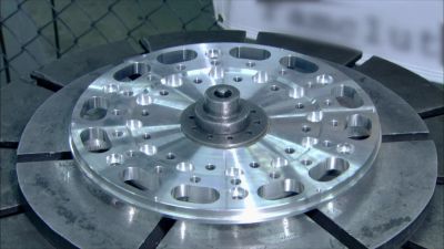Here, the technician sets
the bolts to a precise torque. - How It's Made