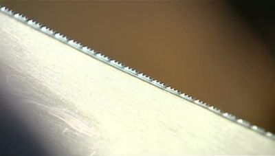 HERE'S A LOOK AT A BLADE
BEFORE HEAT-TREATING. - How It's Made