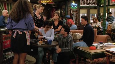 Here's your check. That'll be 4.12. - Friends