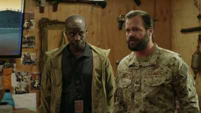 He's a case officer - SEAL Team