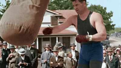 HE'S A STRONG OFFENSIVE FIGHTER, - America in Color