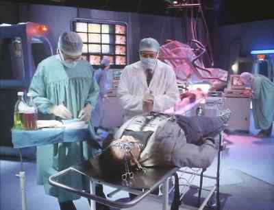 HE'S FADING ON US,
DOCTOR. - Cyborg Cop