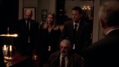 He's getting off the phone
with his daughter. - The West Wing