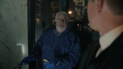 He's got a plastic bag - NCIS: Sydney