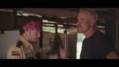 He's got the big hat. Big belt buckle. - Bull Shark 3