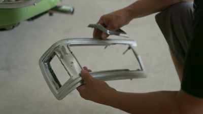 He's having trouble
finding the side
reflector bezel, - Shorty's Dream Shop