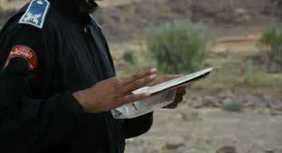 He's holding the rifle he gave me. - Babel