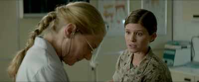 He's just scared and
he hates this muzzle
that he's wearing, - Megan Leavey