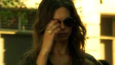 He's making a call
he doesn't want the cops to hear. - Nikita