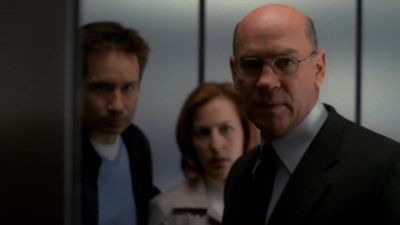 He's on the stairs coming up. - The X-Files