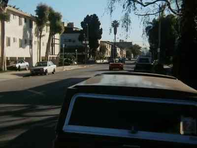 HE'S STOPPING
FOR A LIGHT AT GREGORY. - Hunter