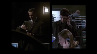 He's taking a canister from the case. - 24