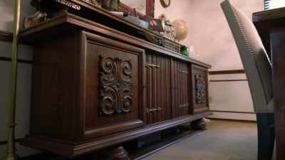 He's taking the doors from
the old buffet in the house, - Renovation Impossible