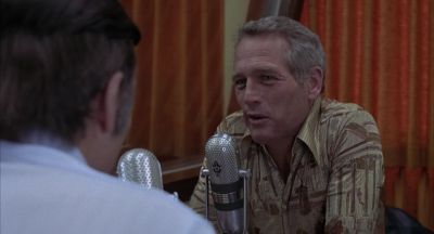 He's the head coach and chief punk on that Syracuse team - Slap Shot