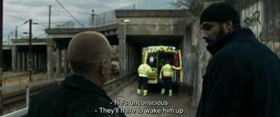 - He's unconscious.
- They'll have to wake him up. - The Marco Effect