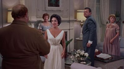He's wearing Brick's birthday present - Cat on a Hot Tin Roof