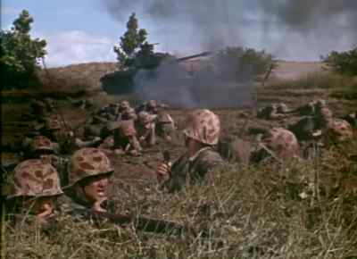 Hey, Domingo, Gunny,
get that tank on that machine gun, - Beach Red