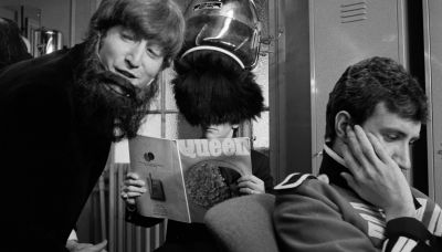 Hey he's reading The Queen That's an in joke you know - A Hard Day's Night
