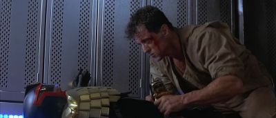 Hey hey wh why you're taking off his clothes - Judge Dredd