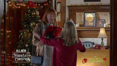 Hey, I got you a
squished poinsettia. - Our Christmas Love Song